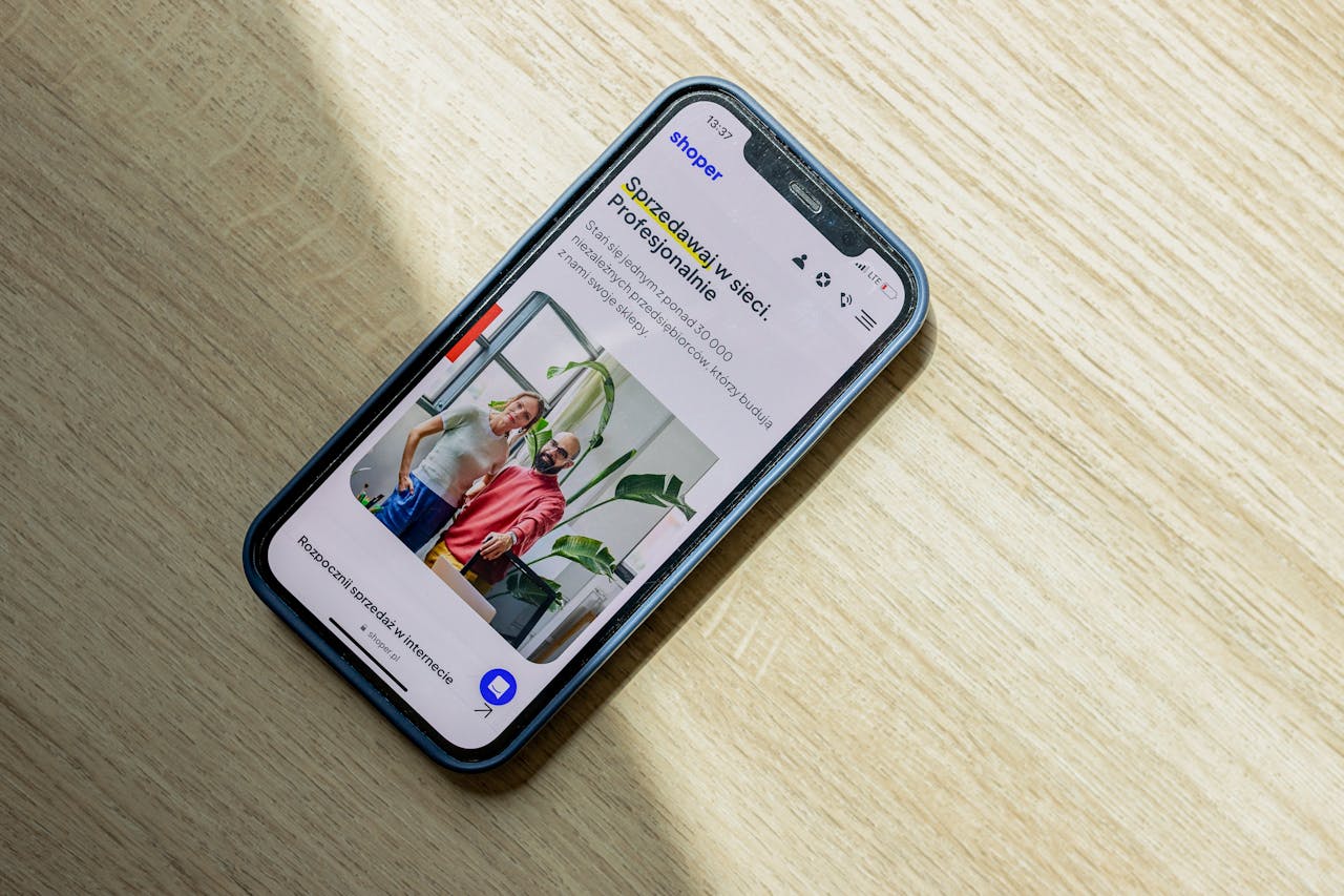 about-01 Smartphone displaying an ecommerce website. Optimize online sales and presence.